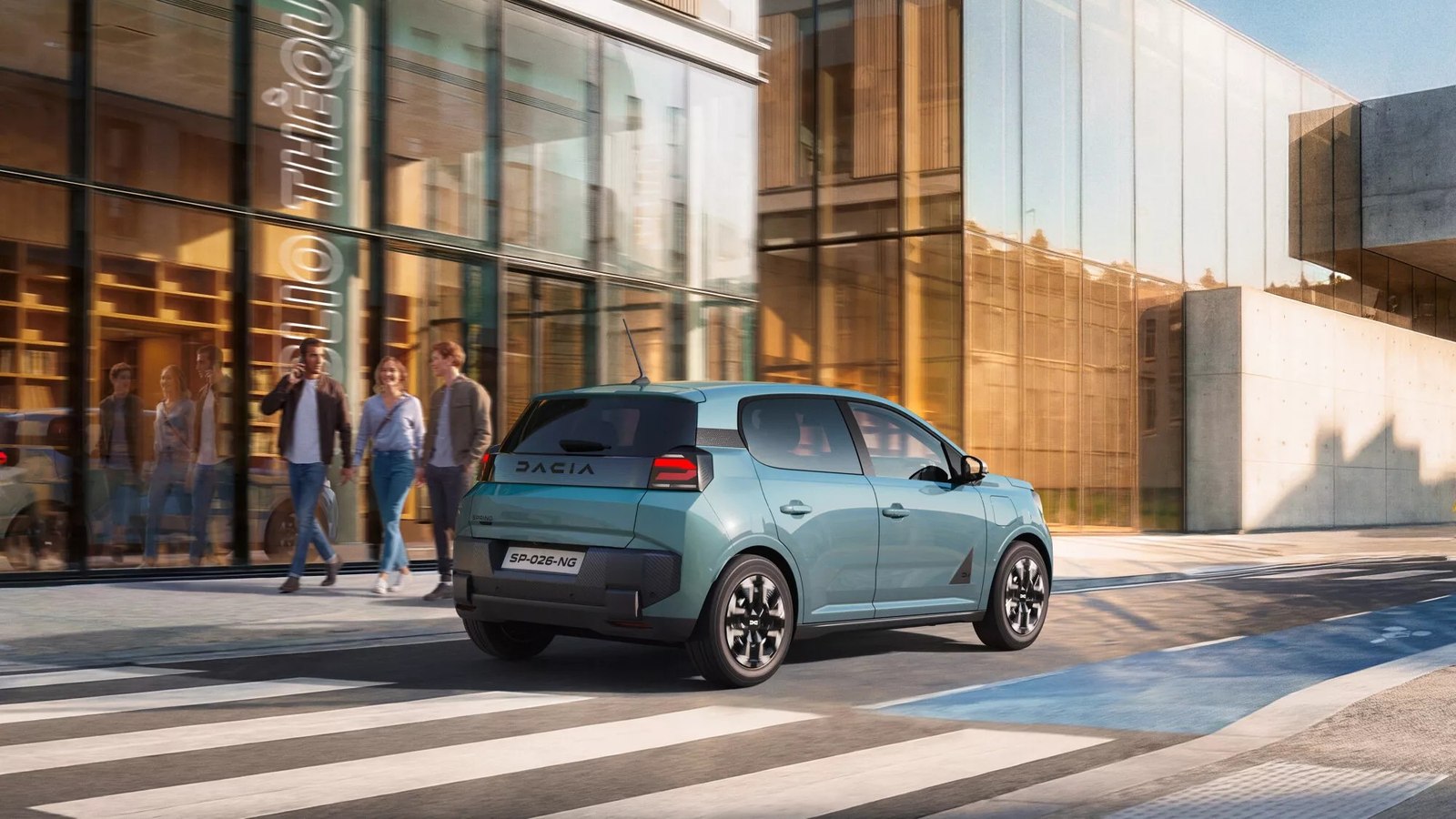 New Dacia Spring rear three quarter on a city street