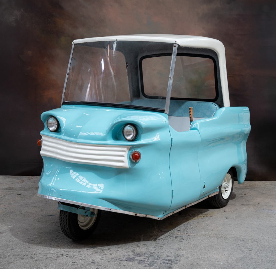 Light blue 1960 Electric Car Company Shopper FG-75 front three quarter