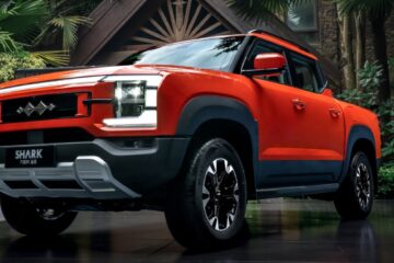 Orange Fang Cheng Bao Shark ute front three quarter