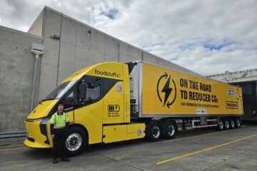 Foodstuffs North Island Deepway Star electric truck with refrigerated trailer at a distribution centre