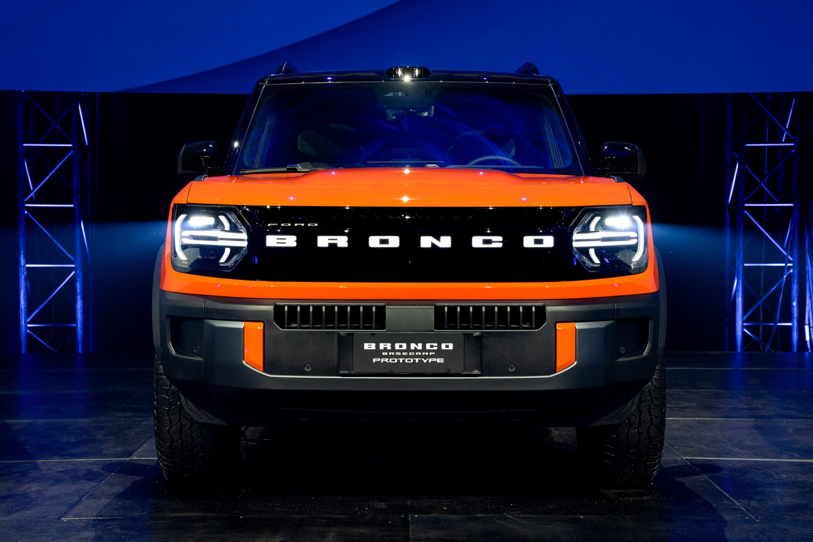 Orange Ford Bronco Basecamp head on under stage lights