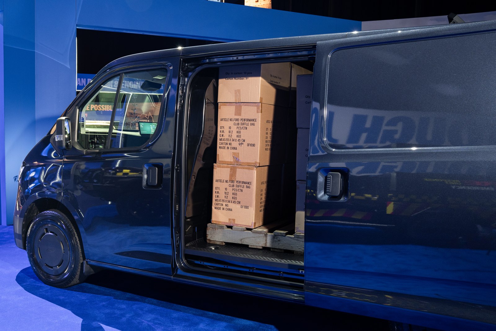 Ford Transit City side sliding door open with boxes inside