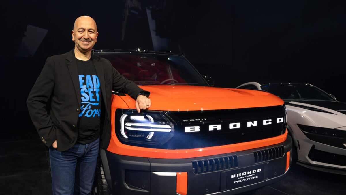 Ford Australia and New Zealand chief executive Fadi Mawal with the orange Bronco Basecamp on stage