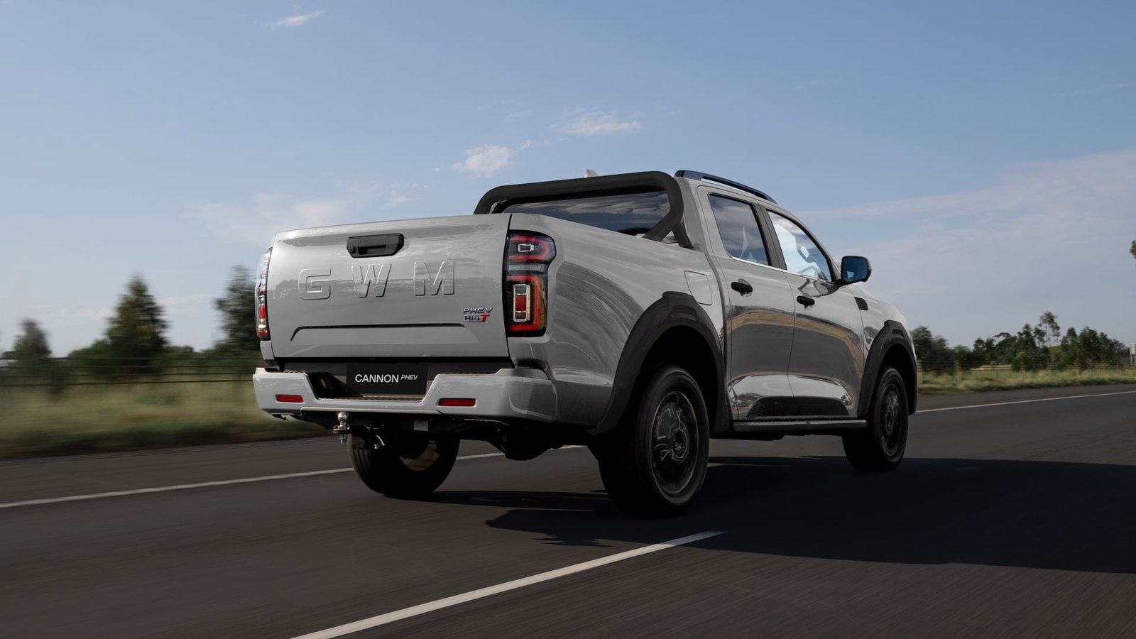 GWM Cannon Hi4-T PHEV rear three quarter on a country road