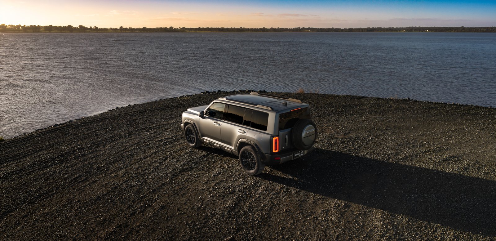 Aerial view of the GWM Haval H7 parked by the water