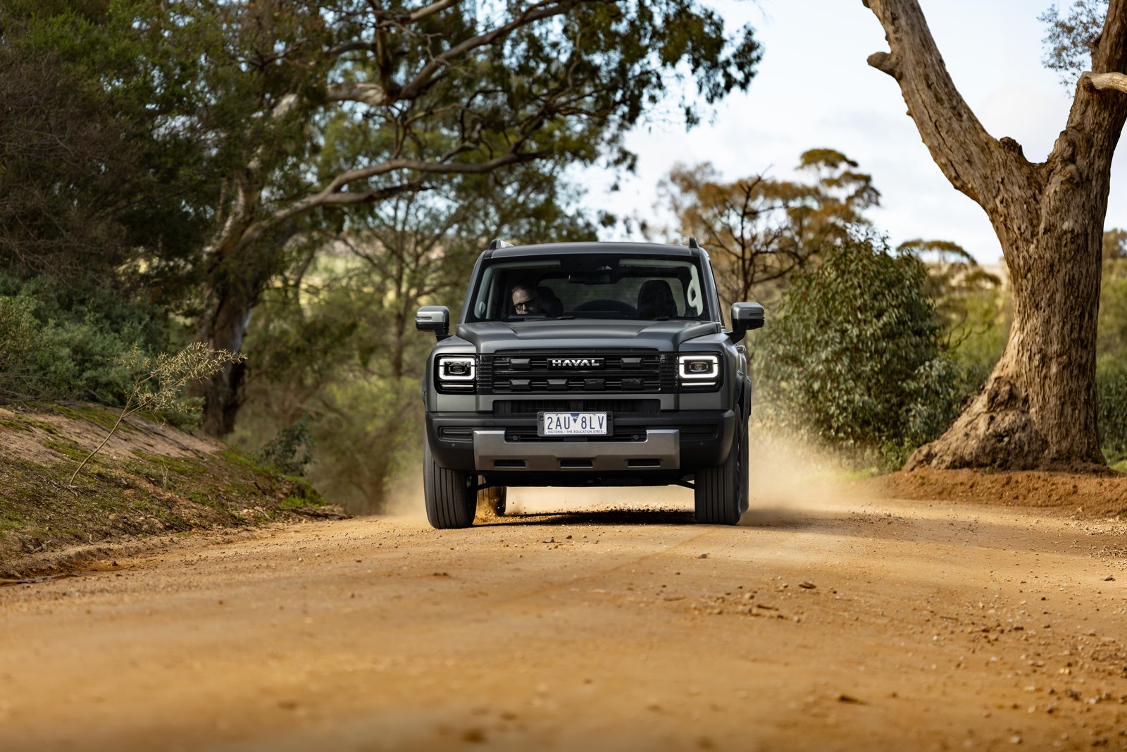 GWM Haval H7 on a dirt track through bush