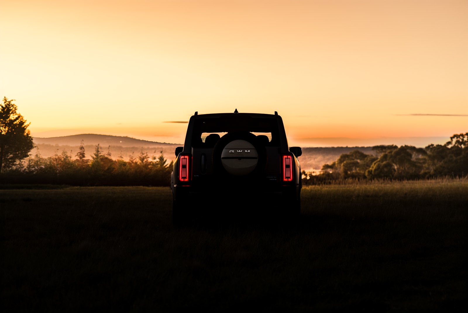 GWM Haval H7 silhouetted at sunset