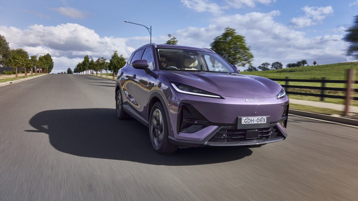 Purple Lepas L6 electric SUV driving on a rural road