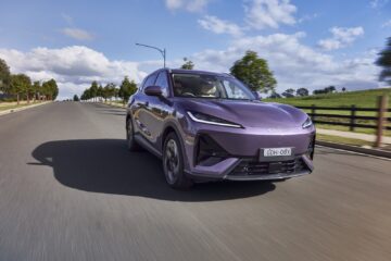 Purple Lepas L6 electric SUV driving on a rural road