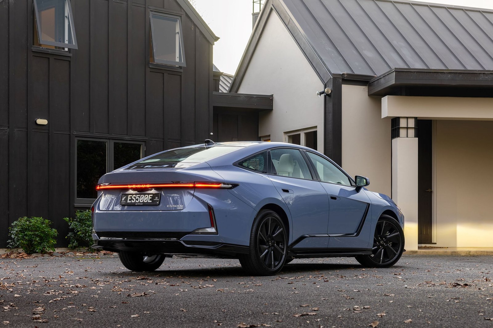 Blue Lexus ES 500e rear three quarter