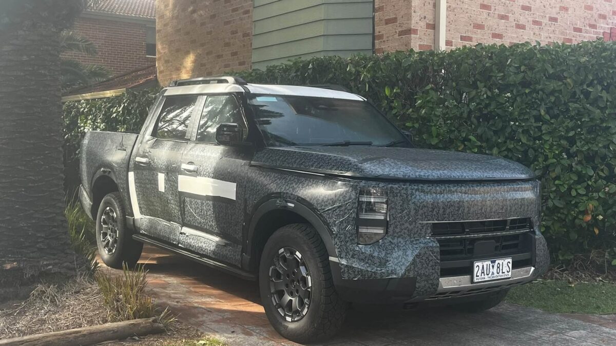 Camouflaged Nissan Frontier Pro prototype parked in a driveway in Kirrawee, Sydney