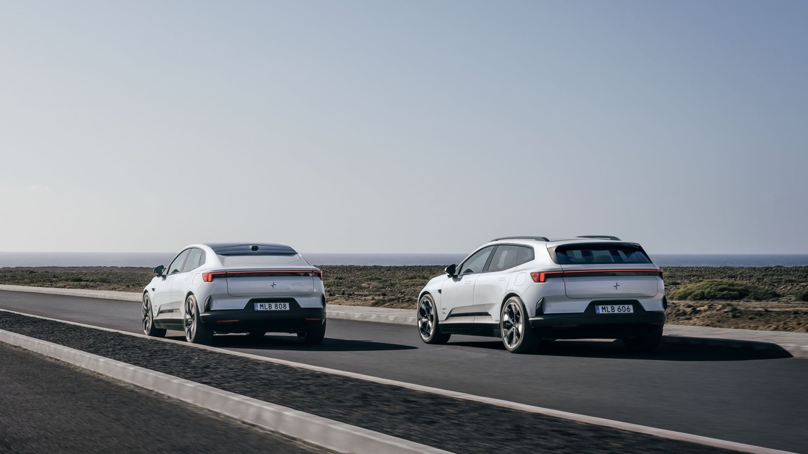 Polestar 4 SUV and Polestar 4 coupe side by side on a road