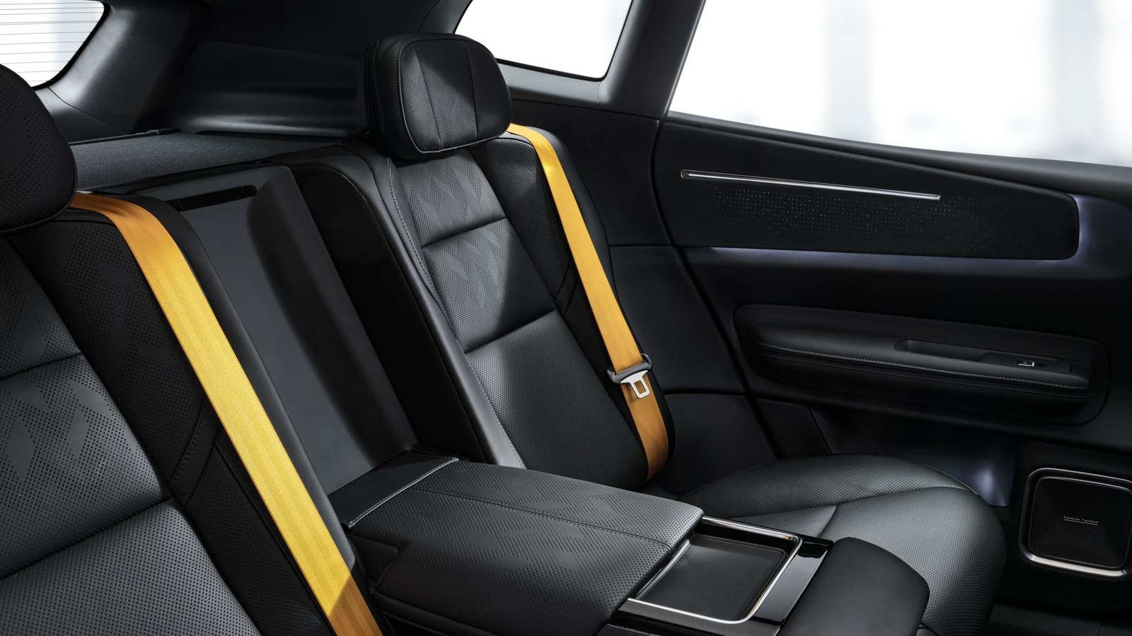 Polestar 4 SUV rear seats with yellow seatbelts