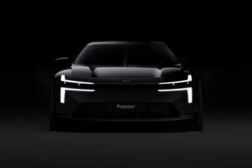 Polestar Formula 2030 concept car front view in darkness with dual blade headlights lit