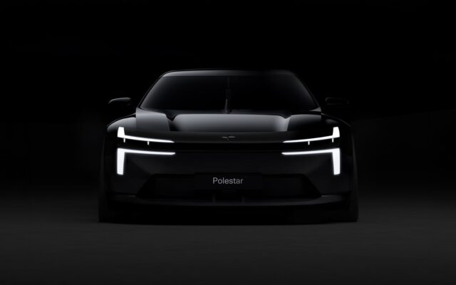 Polestar Formula 2030 concept car front view in darkness with dual blade headlights lit