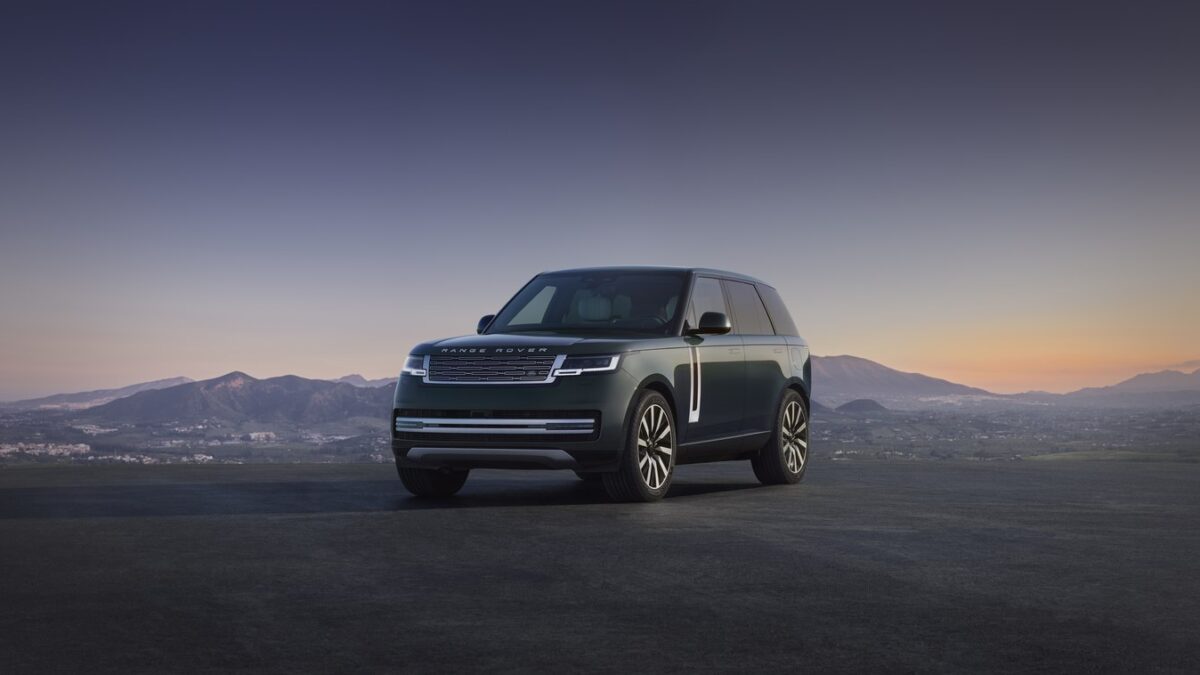 Range Rover Electric front three quarter at dusk