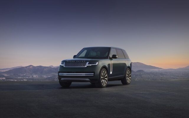 Range Rover Electric front three quarter at dusk