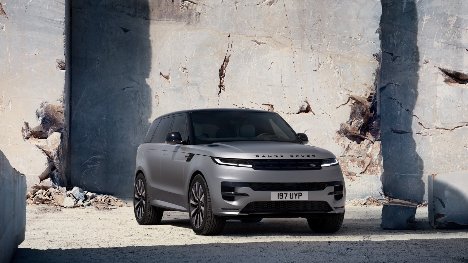 Grey Range Rover Sport Electric parked in a marble quarry