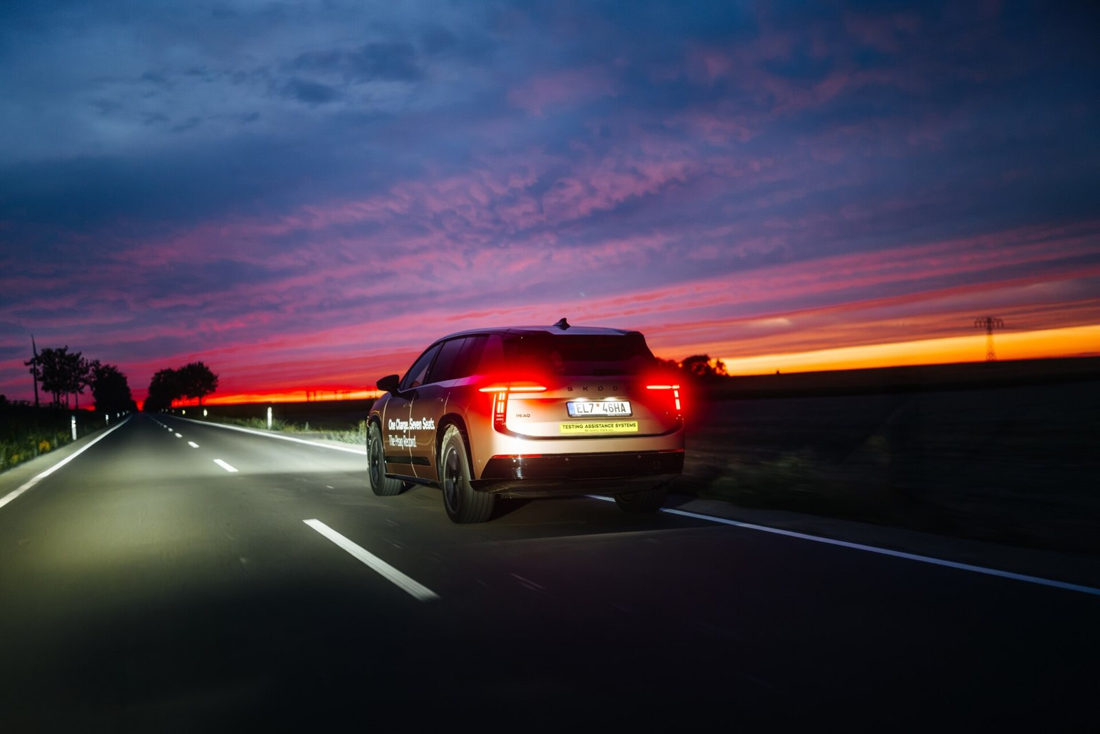 Skoda Peaq driving at dusk during its record run