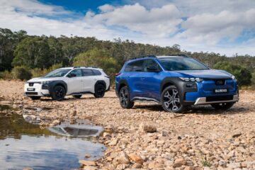 White Subaru Trailseeker AWD and blue Trailseeker AWD Touring parked on a riverbed