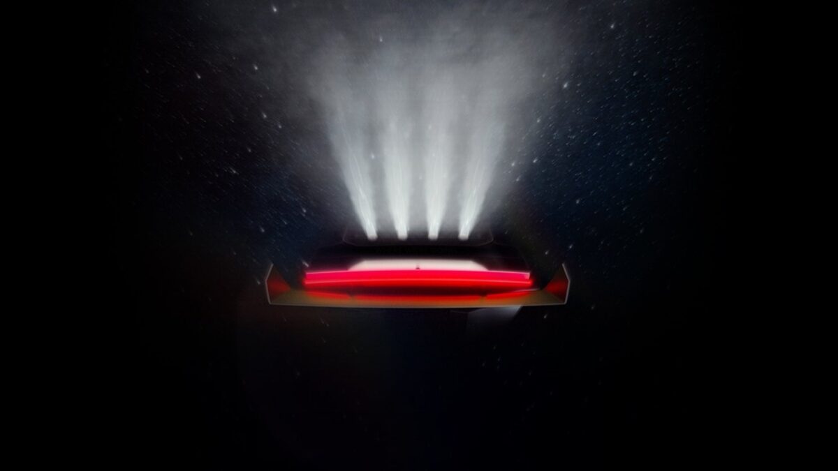 Tesla Roadster teaser image showing the rear of the car upside down with four thruster plumes against a starfield