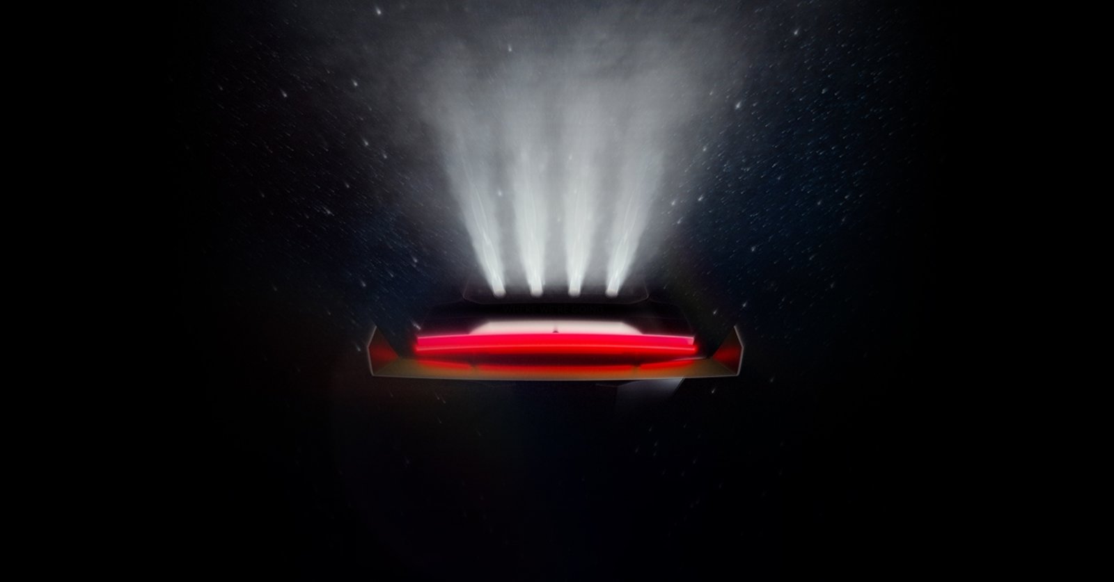 Tesla Roadster teaser image showing the rear of the car with four thruster plumes