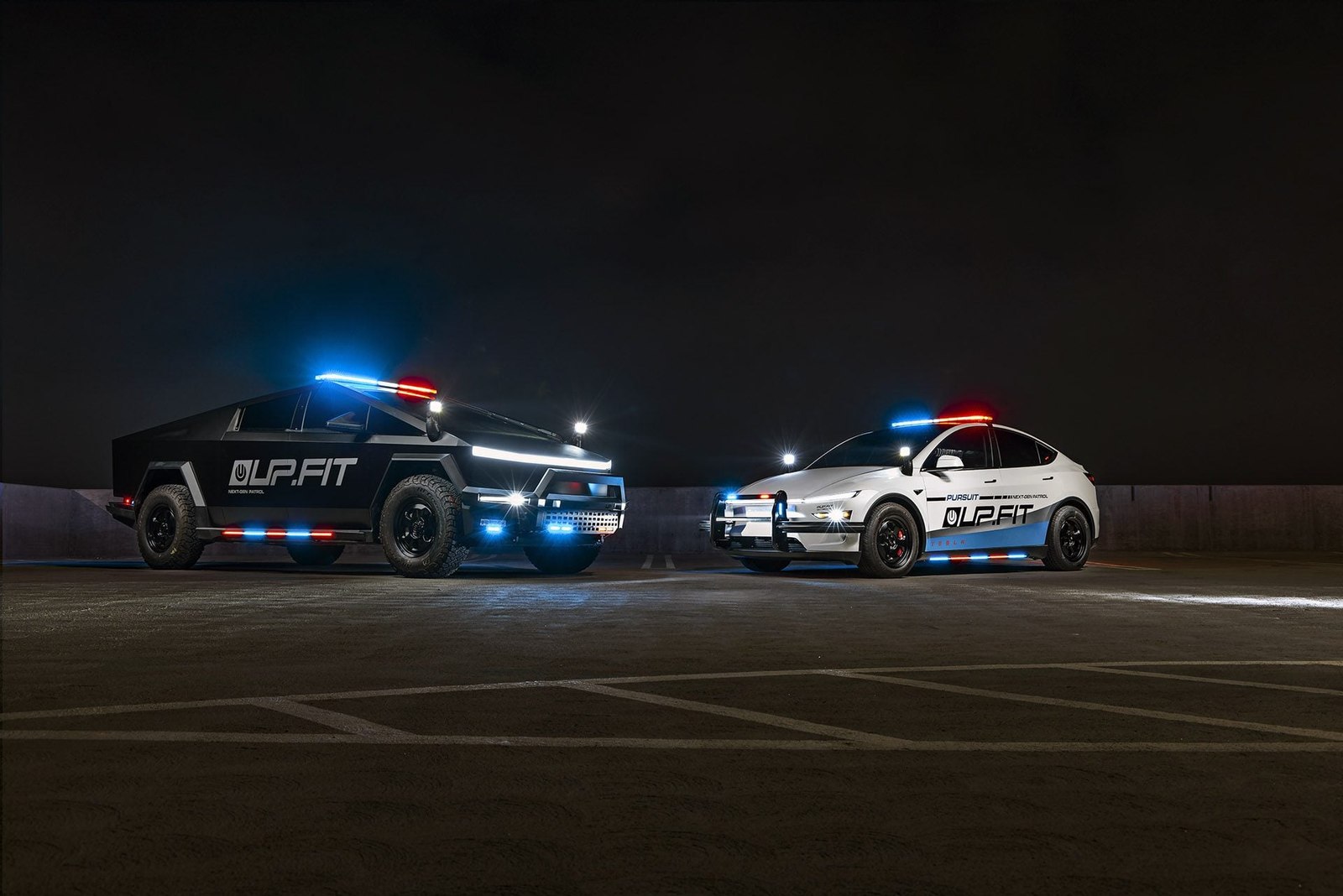 UP.FIT Tesla Cybertruck and Model Y patrol vehicles with lights on at night
