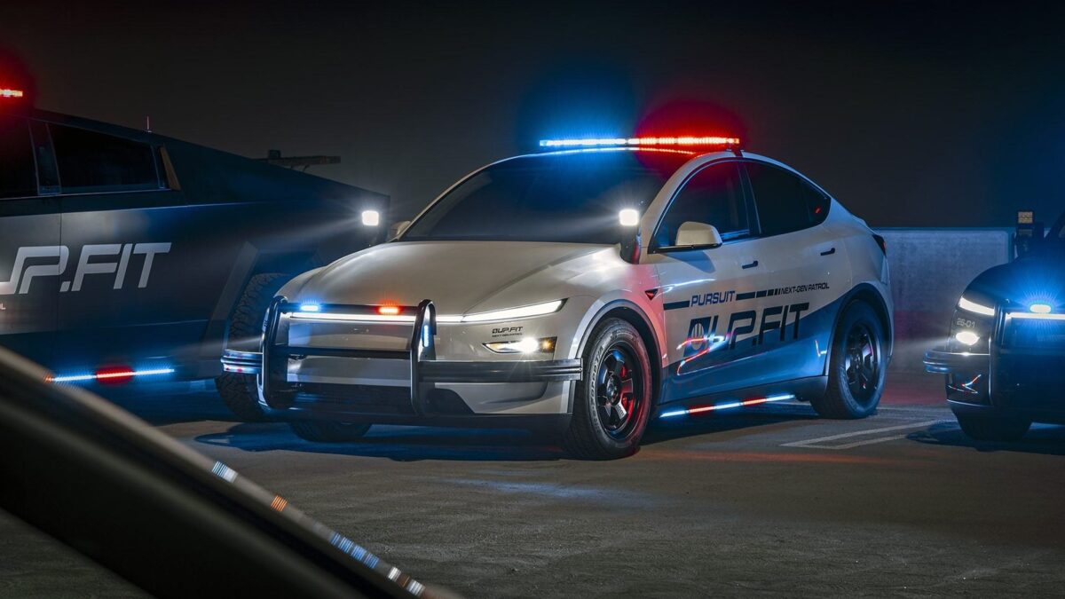 UP.FIT Tesla Model Y patrol car with light bar illuminated at night