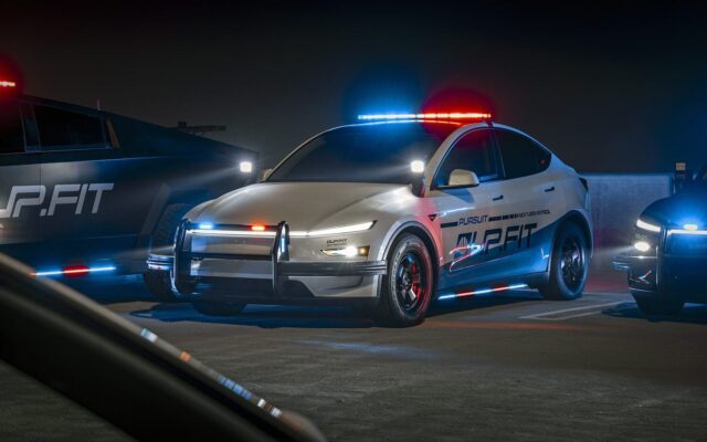 UP.FIT Tesla Model Y patrol car with light bar illuminated at night