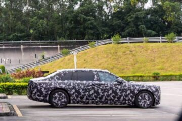 Camouflaged Yangwang flagship sedan in side profile
