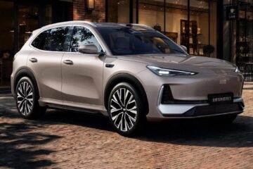 Updated 2027 Geely EX5 electric SUV in champagne paint