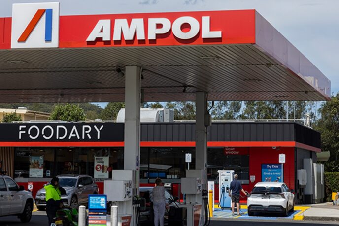 Ampol service station with an EV charging bay beside the Foodary store