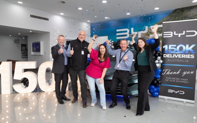 BYD staff celebrate Australia’s 150,000th BYD delivery, a Seal 6 Touring, at BYD Warrnambool