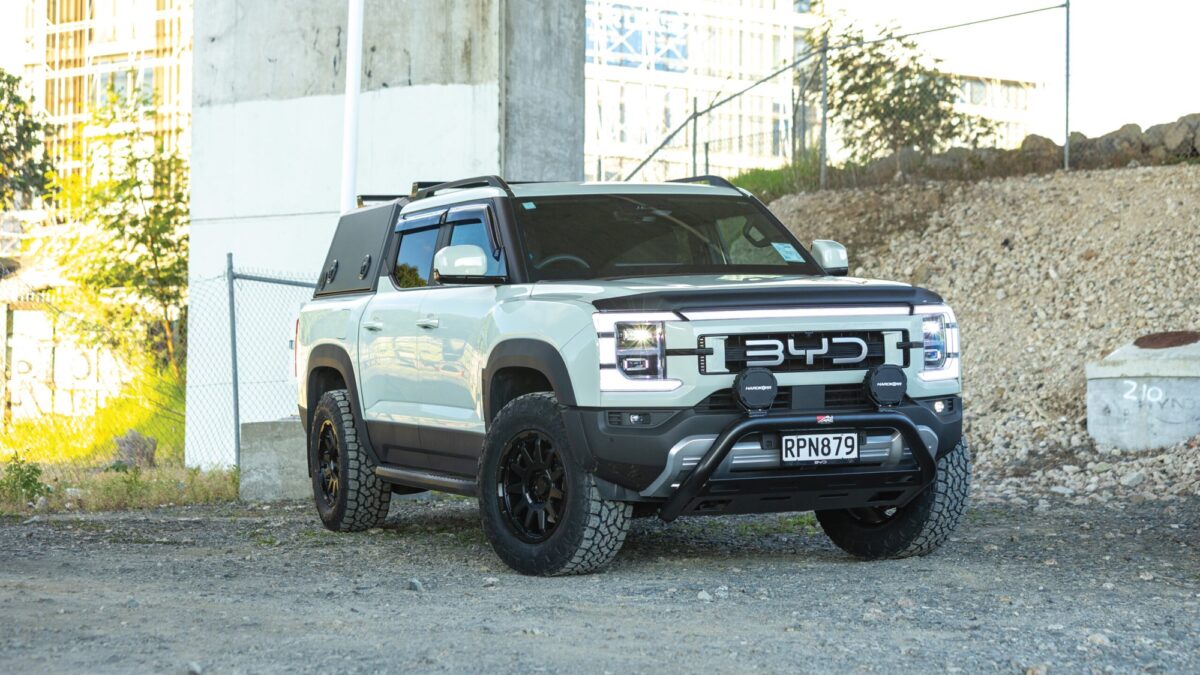 White BYD Shark 6 ute parked on gravel