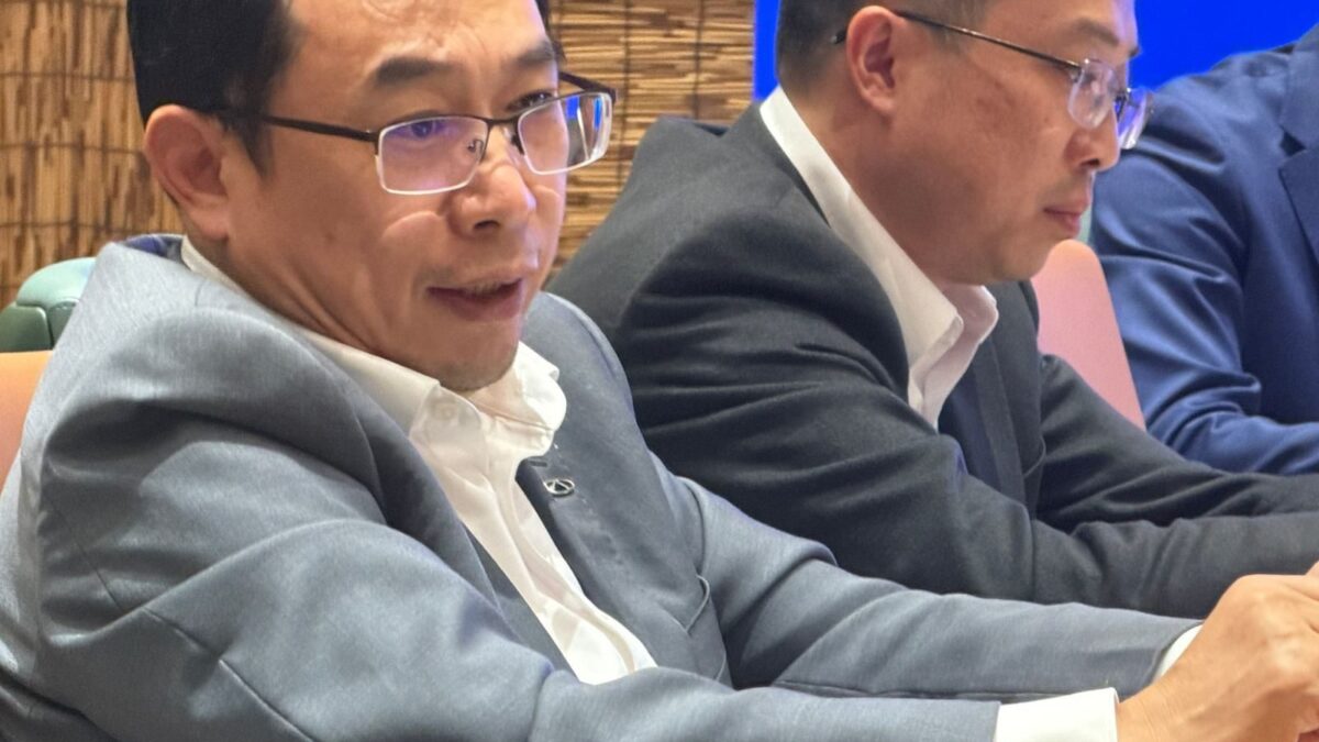 Chery International president Zhang Guibing answering questions at a media round table in Wuhu, China