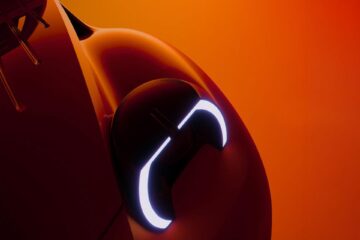 Dome-shaped LED headlight on the front wing of the electric Citroen 2CV