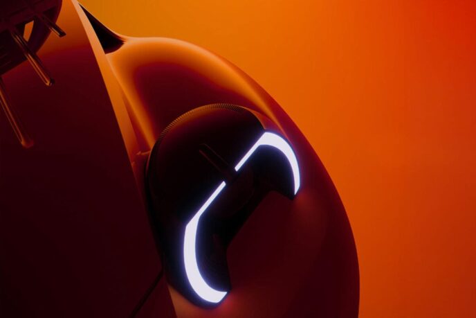 Dome-shaped LED headlight on the front wing of the electric Citroen 2CV