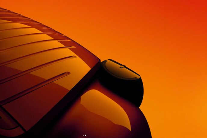 Bonnet strakes and door mirror of the electric Citroen 2CV in orange