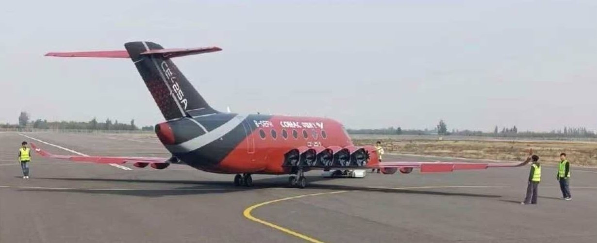 COMAC CE-25A electric aircraft rear three-quarter view on a taxiway