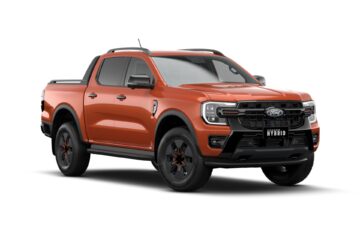 Orange Ford Ranger Hybrid Wildtrak front three-quarter view