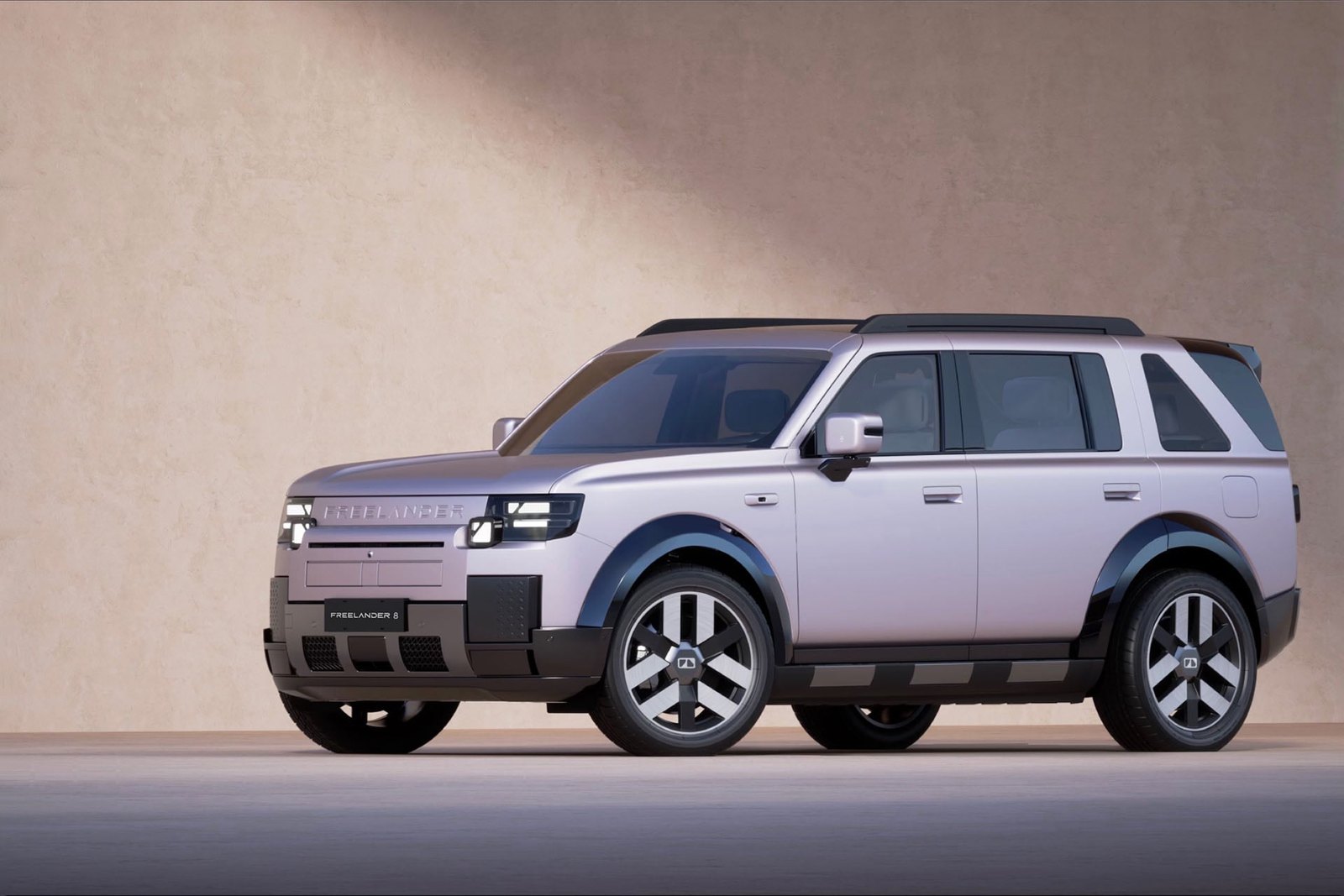 Front three-quarter view of the silver Freelander 8 SUV