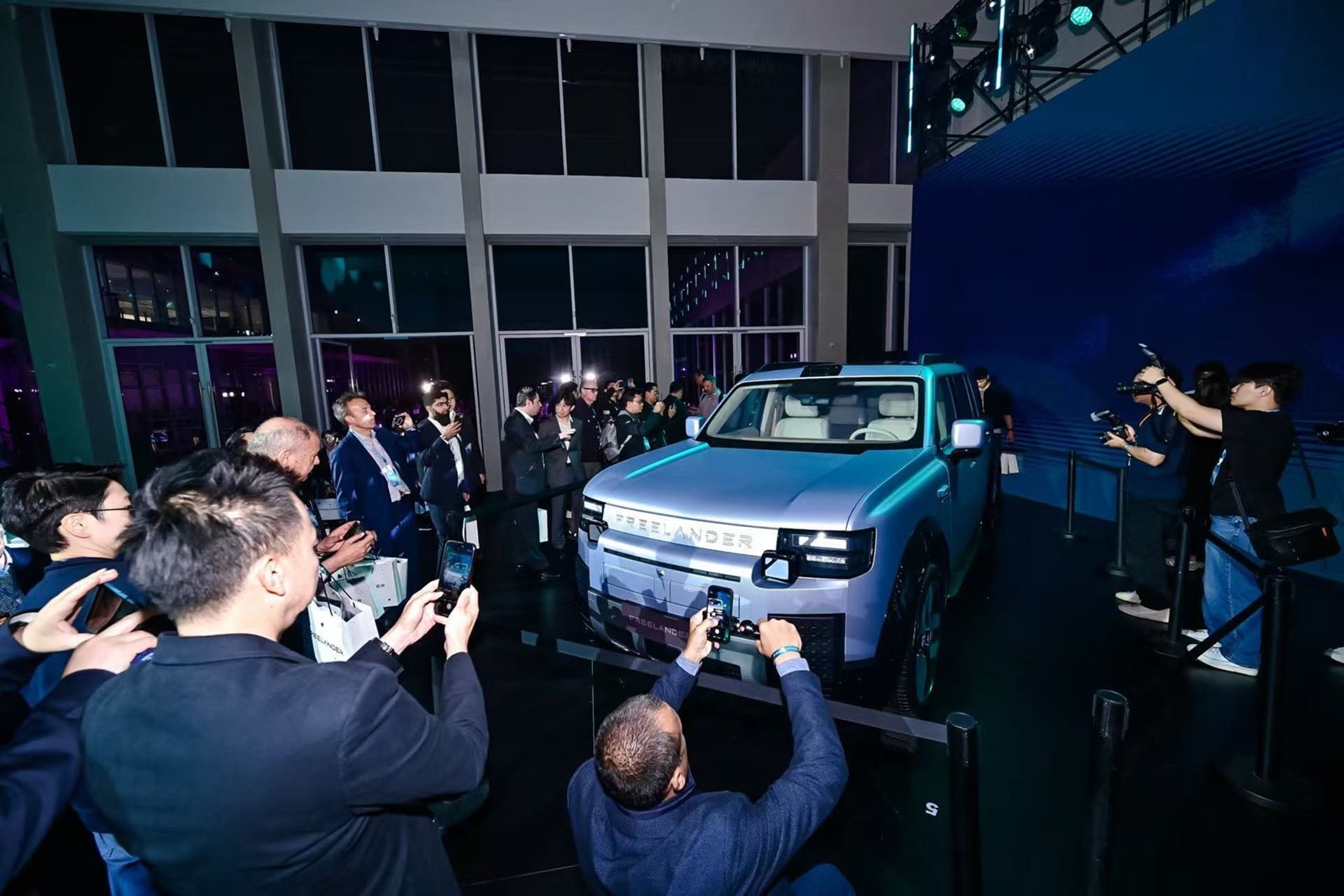 Media photographing the Freelander 8 at its launch event