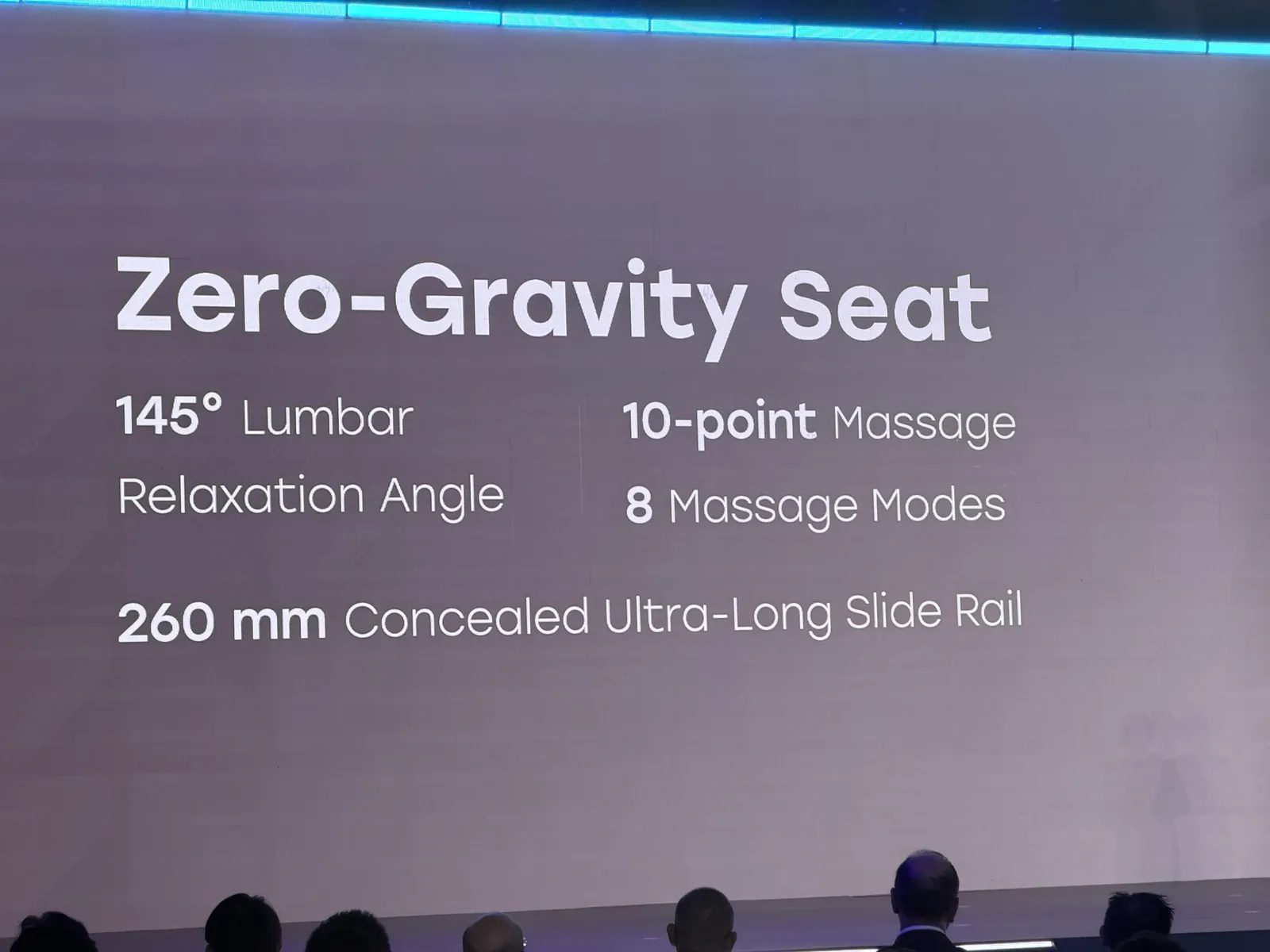 Slide detailing the Freelander 8 zero-gravity seat with 145-degree relaxation angle and 10-point massage