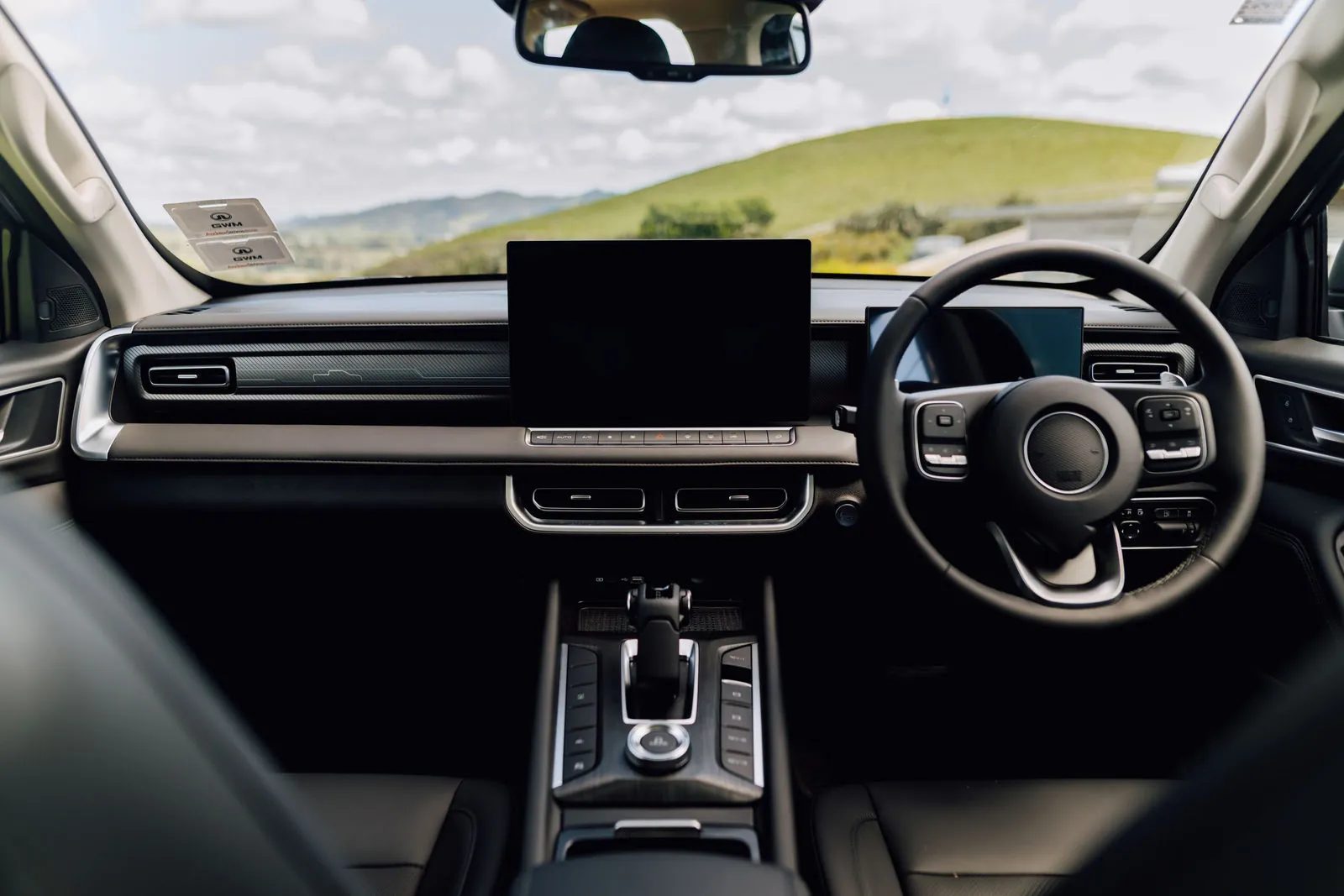 Dashboard of the GWM Cannon Hi4-T PHEV with 15.6-inch touchscreen and digital driver display