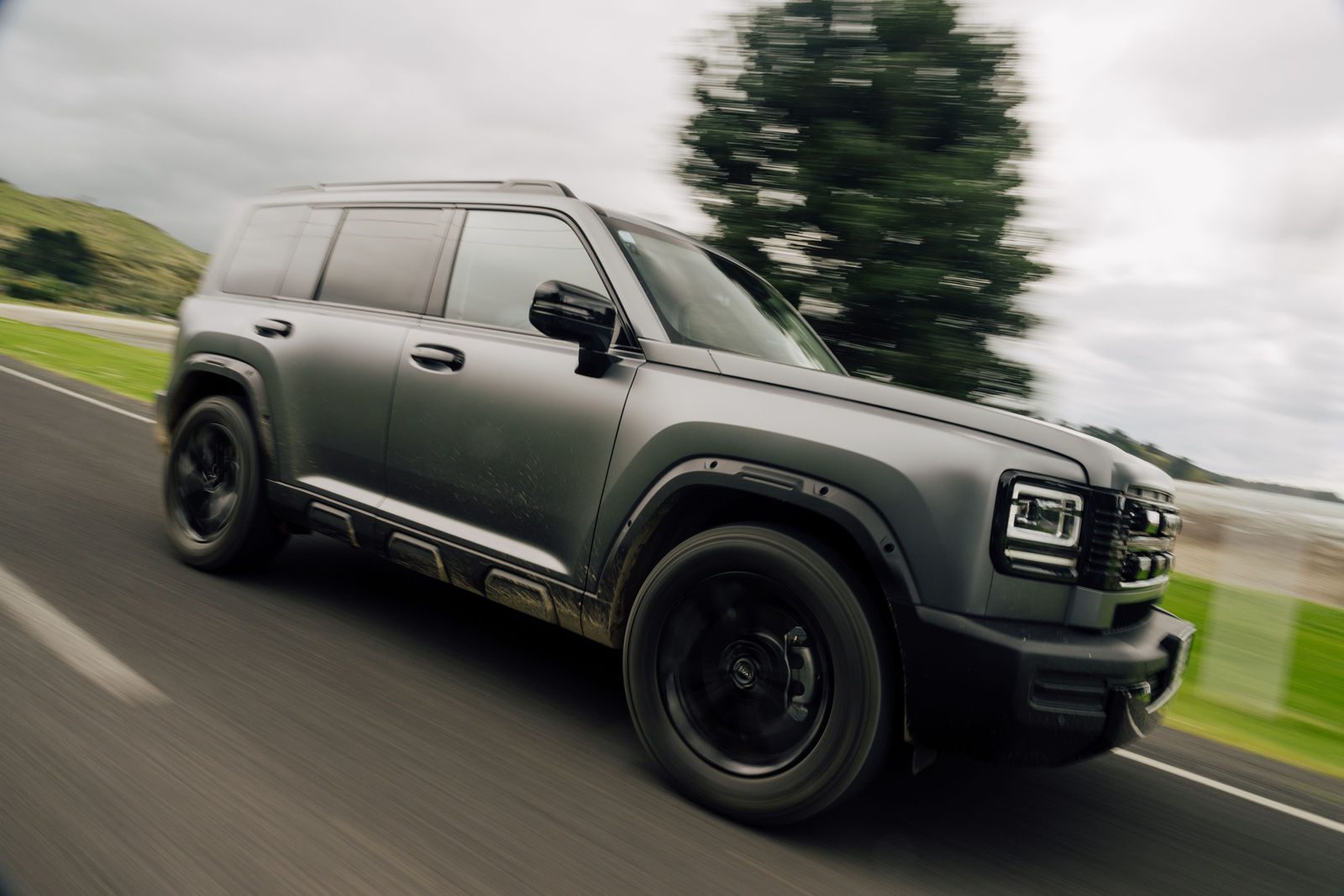 Matte grey Haval H7 driving on a sealed road