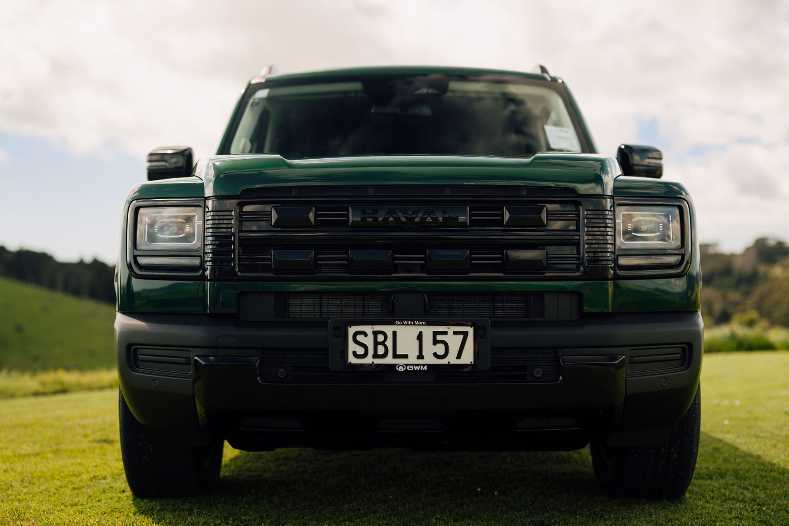 Front view of the green Haval H7 showing its grille