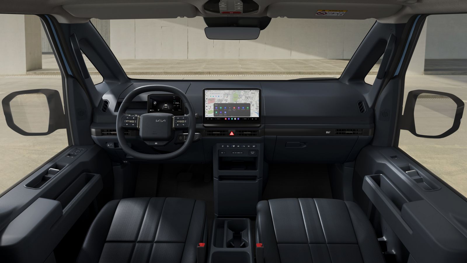 Kia PV5 Passenger dashboard with 12.9-inch touchscreen and artificial leather seats