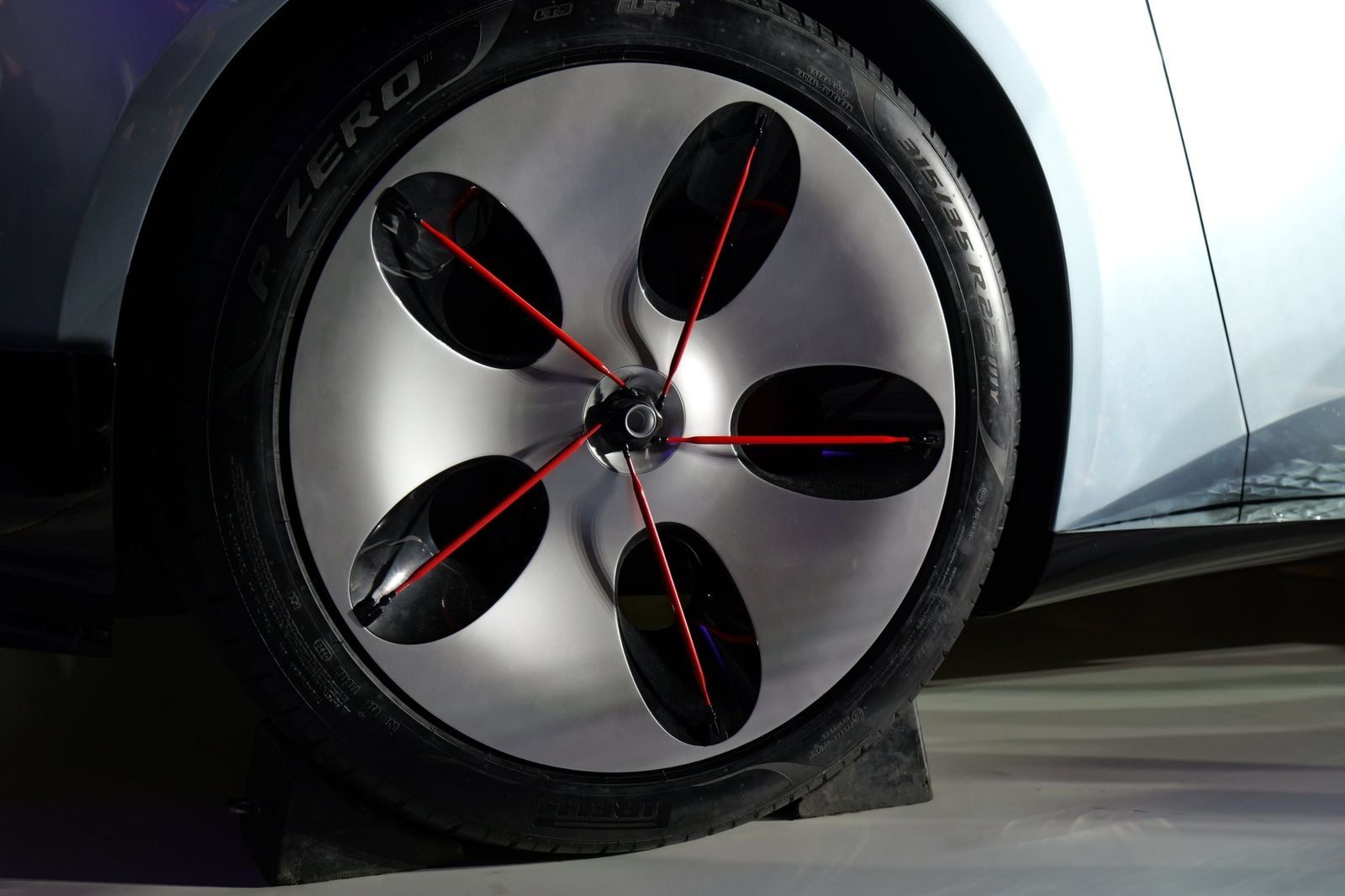 Lepas Aura concept 22-inch aero wheel with red spokes and Pirelli P Zero tyre