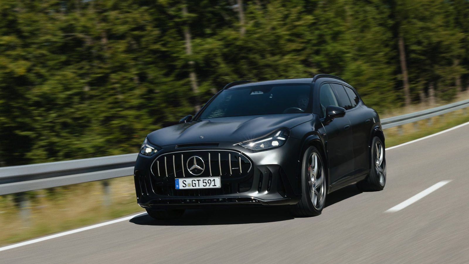 Black Mercedes-AMG GT SUV driving on a road