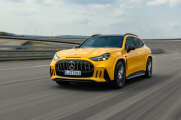 Yellow Mercedes-AMG GT SUV driving on a test track